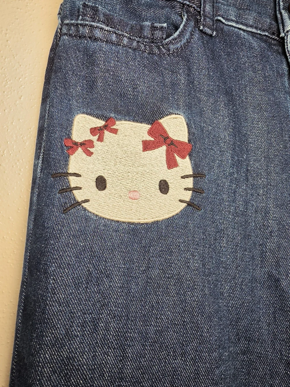 The Children's Place Dark Blue Denim Hello Kitty Jeans with Cream & Pink Accents